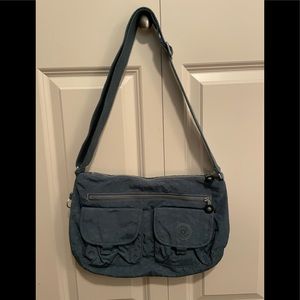 NWOT Kipling denim blue Arkan medium crossbody bag with adjustable straps